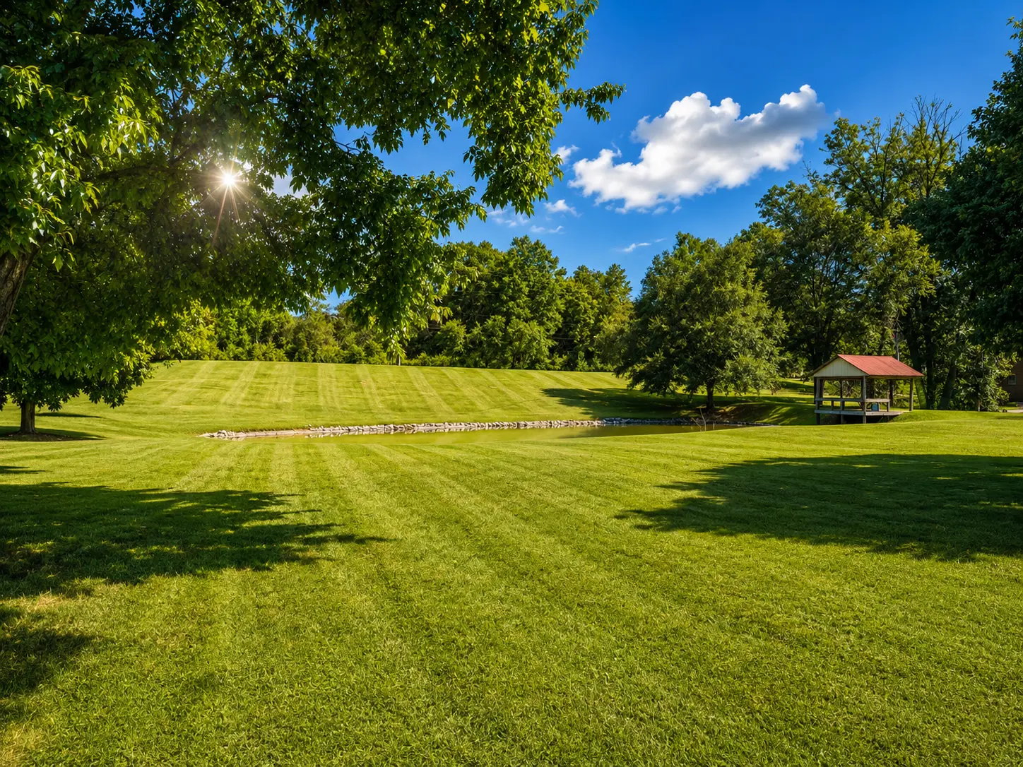 Open grounds and a pond on a managed property